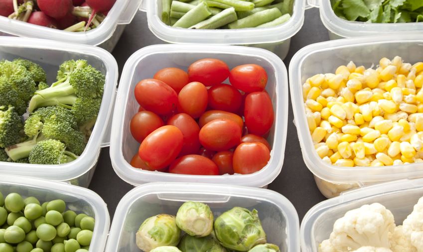 Different types of food being stored in plastic containers